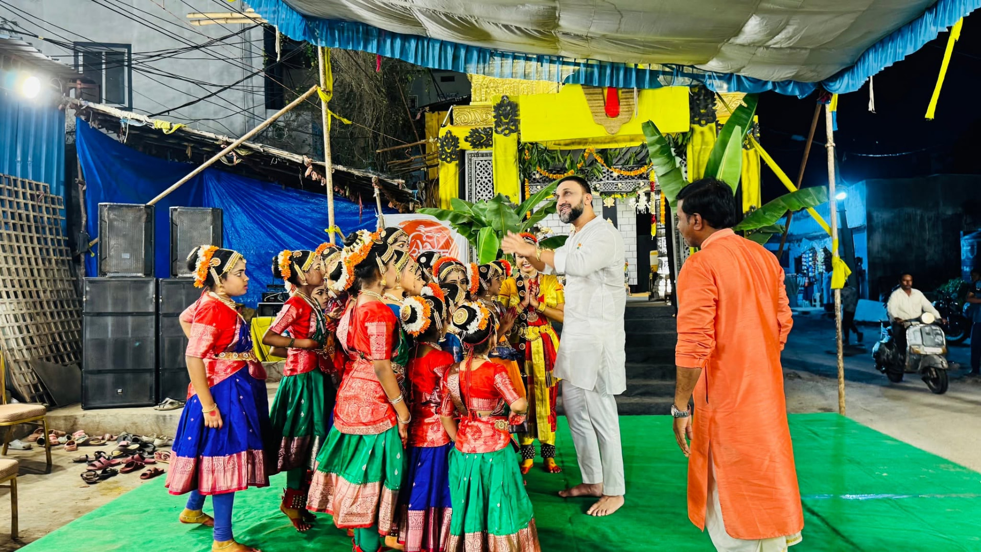 Mohammed Feroz Khan felicitating children at a cultural celebration